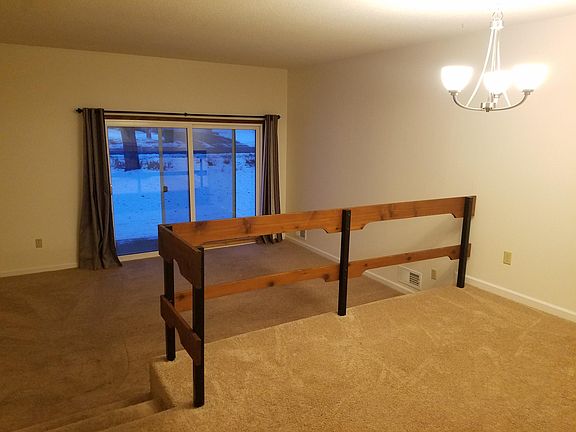 Dining room off kitchen is open to living room.