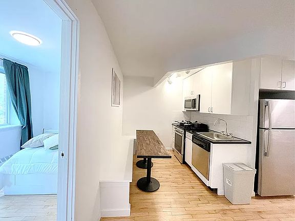 3rd image of 319 E 8th St APT 3A