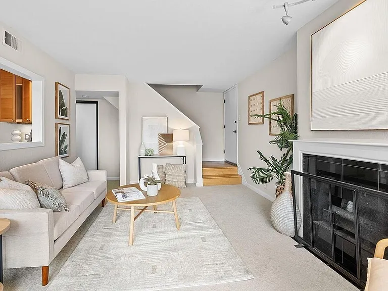Cozy Gas fireplace one-touch button and lots of natural light in the living room