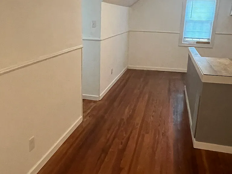 upstairs bonus room (with knee wall around stairwell)