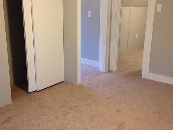 First bedroom and entranceway to attached second bedroom