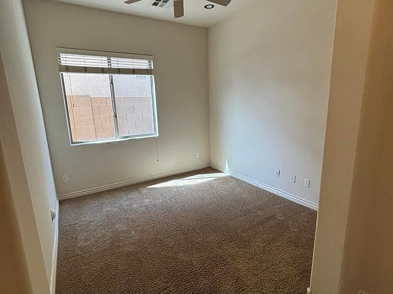 BEDROOM 2 WITH WALK IN CLOSET. NO DOORS ON THIS BEDROOM. WORKS BETTER AS AN OFFICE.