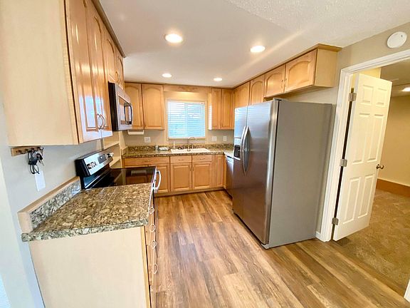 kitchen and door to family room or 4th bedroom