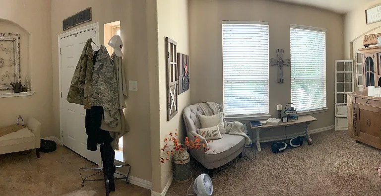Panorama of the entry way and the front room/office