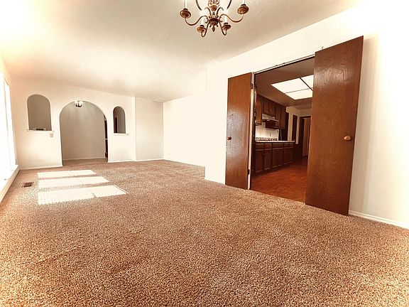 Looking toward front entry from living area