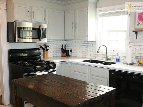 Newer features in kitchen include granite counters, subway tile back splash, painted cabinets and dishwasher in 2016.