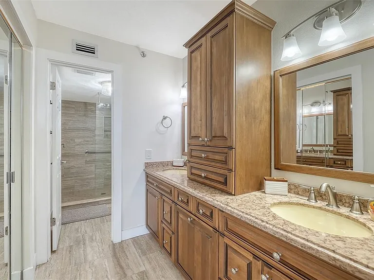 Primary bathroom, double sinks and lots of storage _ blow dryer for your convenience