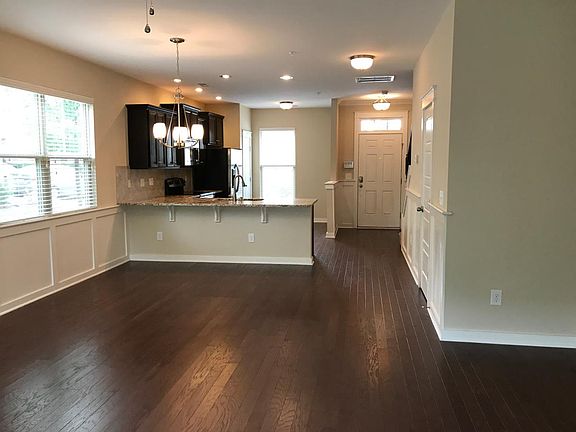 Spacious, bright living room, with breakfast bar and dining