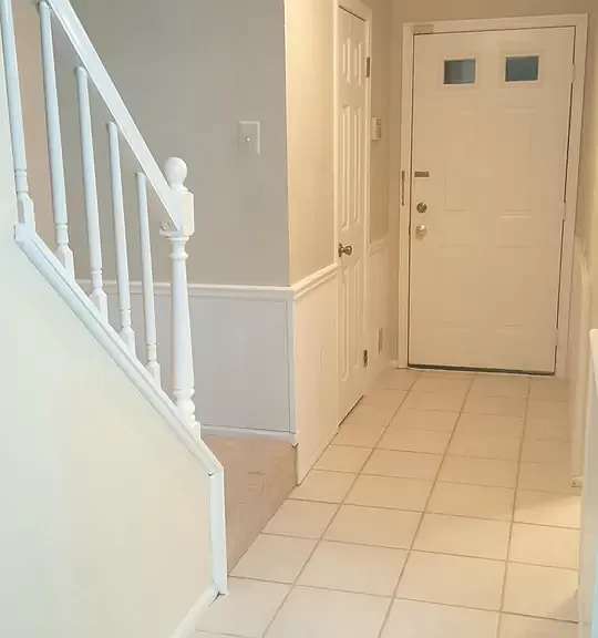Tile foyer, kitchen and powder room