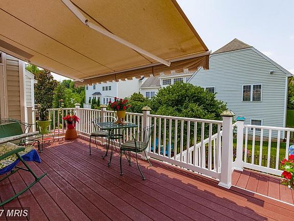 Deck with remote awning