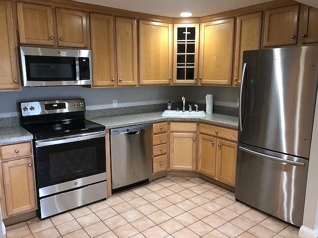 All brand new stainless steel appliances. Garbage disposal in sink