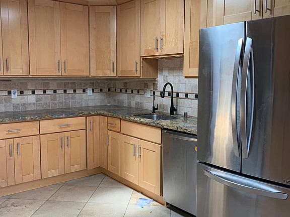 Kitchen with LG refrigerator