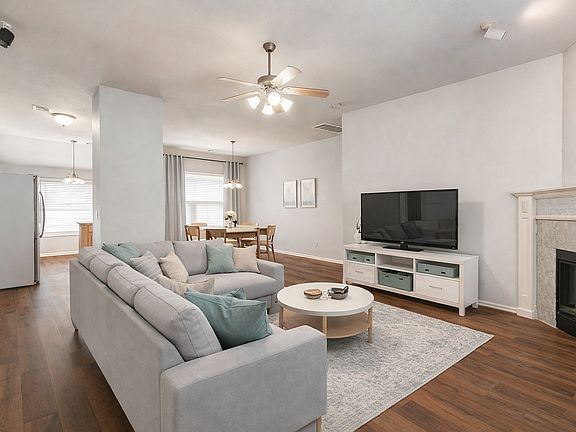 Spacious open living area with fireplace and plenty of room for entertaining