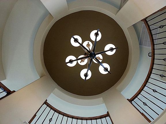 Elegant upward view of rotunda with hanging chandelier!