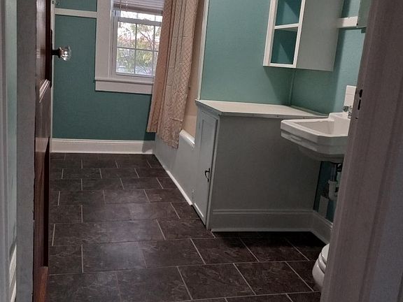 Bathroom with tub and shower