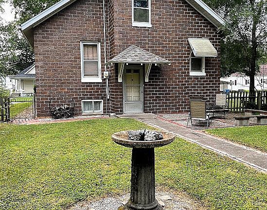 West side of house/backyard