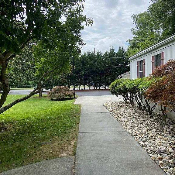 Sidewalk to the front of the Home