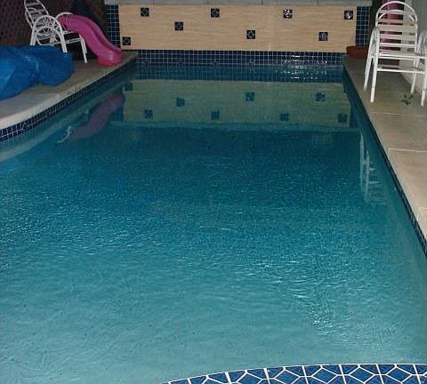 renewly resurfaced pool and jacuzzi