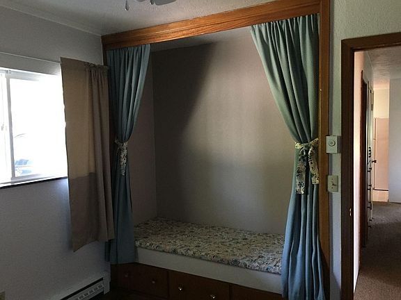 Third bedroom/study. All three bedrooms have original hardwood parquet floors.