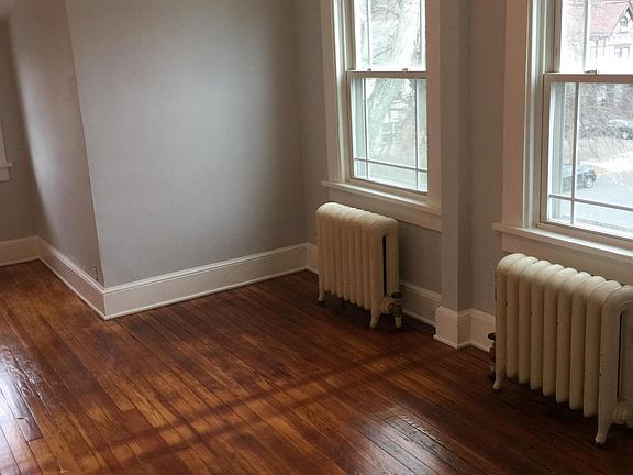 The front room is an " L " shape. This is the right leg of the room.