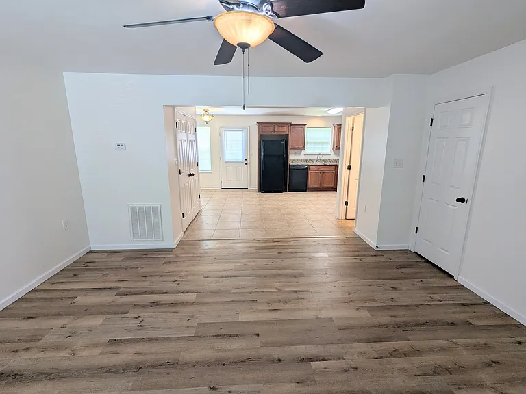 Living room looking into kitchen area