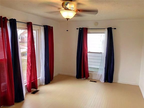 Living room with painted hardwood floor