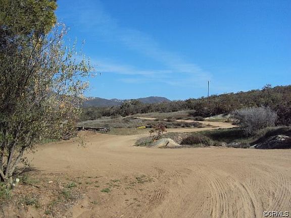Pads and reservoirs line the property from unfinished projects a