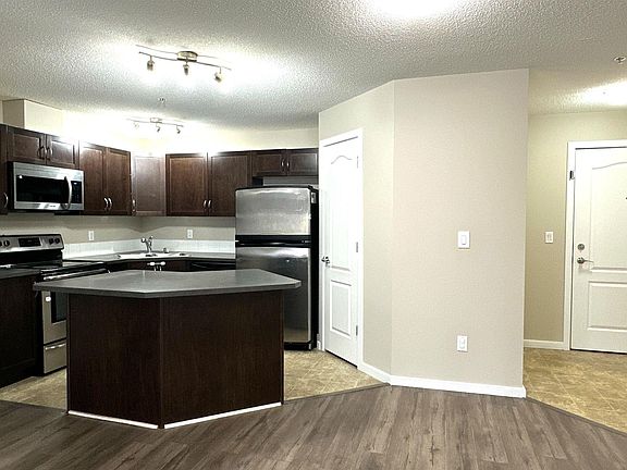 2nd image of 392 Silver Berry Rd NW #111