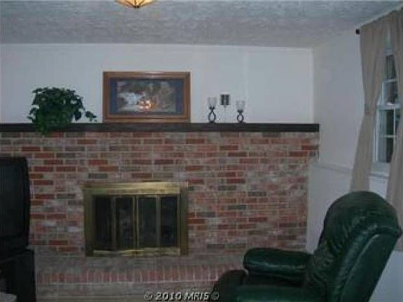 Den with Wood Burning FP