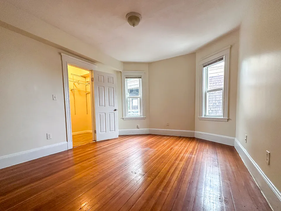 Generous master bedroom _ walk-in closet, 9-foot ceilings, and hardwood throughout.