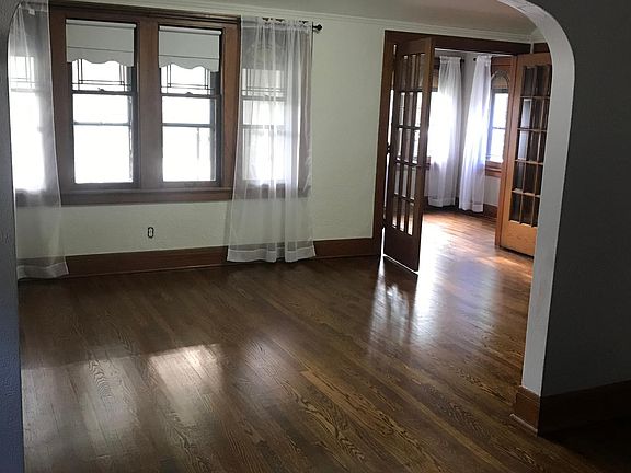 Living room to sun room. All in new paint