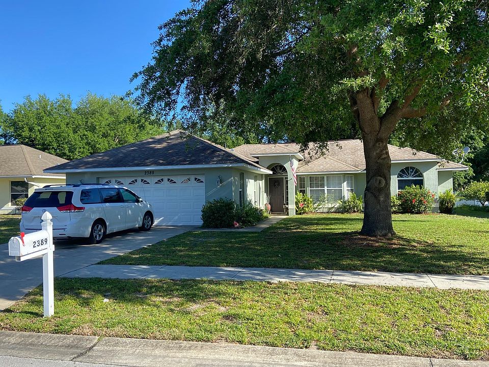 Front of house, with extra large two car garage. Neighborhood walking paths.