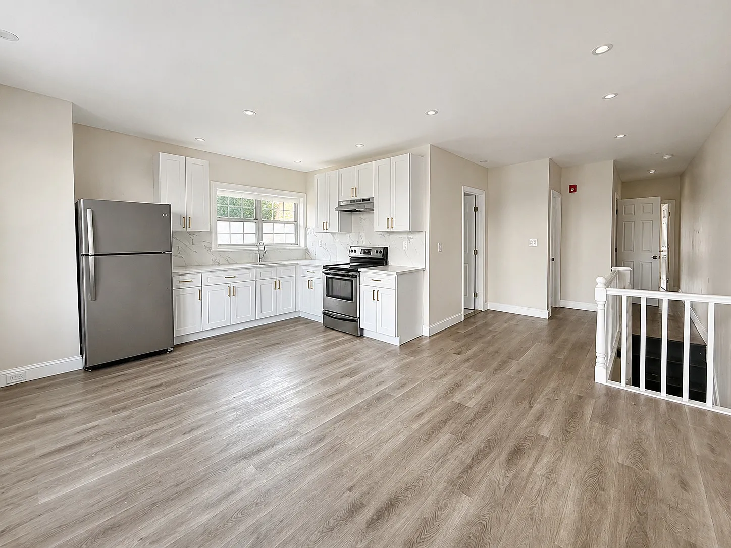 Second-Floor Three-Bedroom Unit with In-Unit Laundry — Photo 4