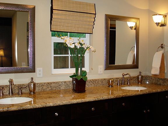 Master Bath with 2 sinks. Granite counters, travertine floors and spacious shower.
Separate Water Closet.
Full size Washer and Dryer hook ups for Side by side laundry is located in master bathroom behind doors.