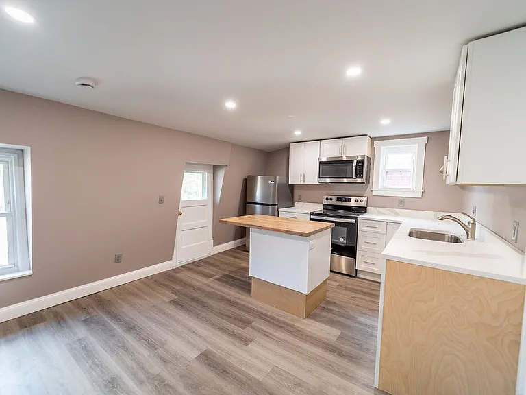Beautiful newly restored kitchen/shared room, modern appliances and butcher block island!