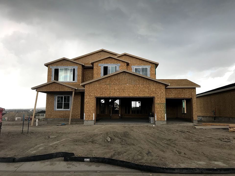 Framing underway for our new Jackson home. Photo of home under construction