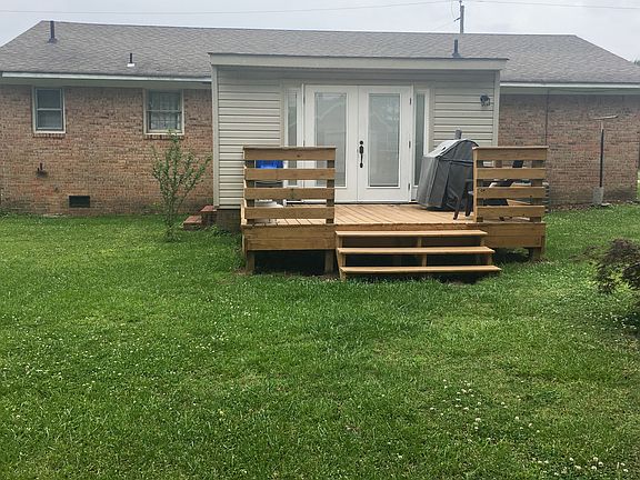 Rear Exterior with Deck and Bonus Room