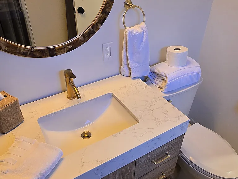Gold accents and storage.
