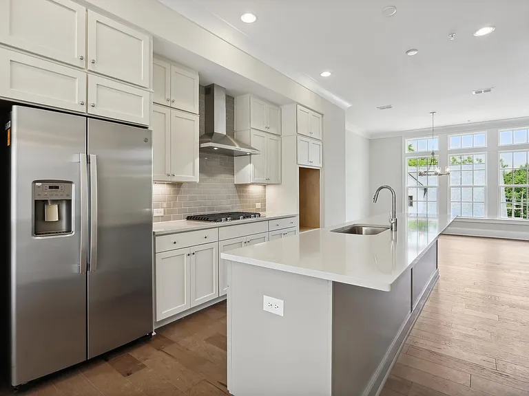 Kitchen with quartz center counter