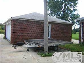 DETACHED BRICK GARAGE WITH NEWER DOOR