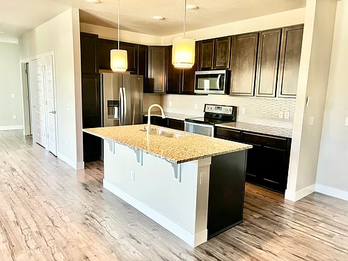 15354 W 64th Ln #302 Photo 1