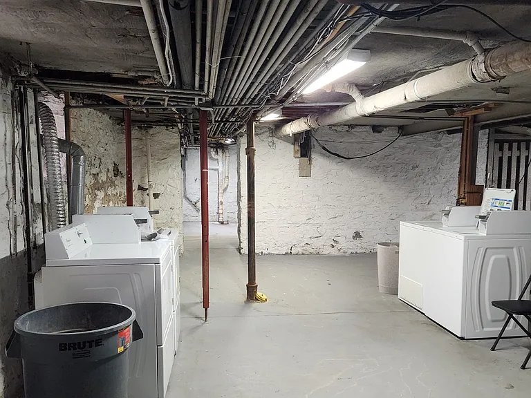 Basement washer and dryer.