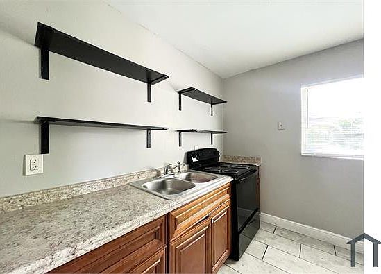 3rd image of 9220 N 13th St APT B