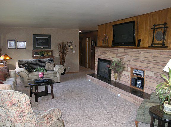 Large living room with gas fireplace.