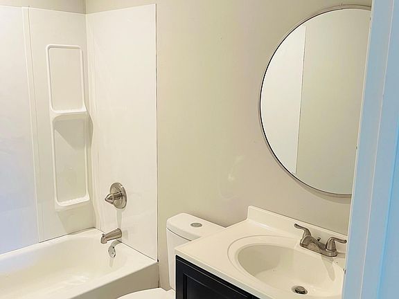 One of the two full bathrooms