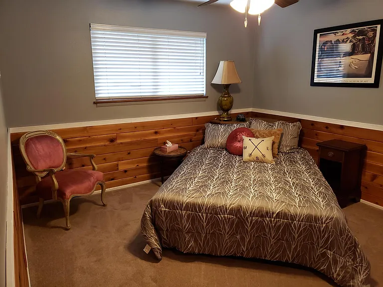 Main/upstairs bedroom. Currently includes a queen bed only. Other furniture was staging only. Negotiable to add furniture back in or remove completely.