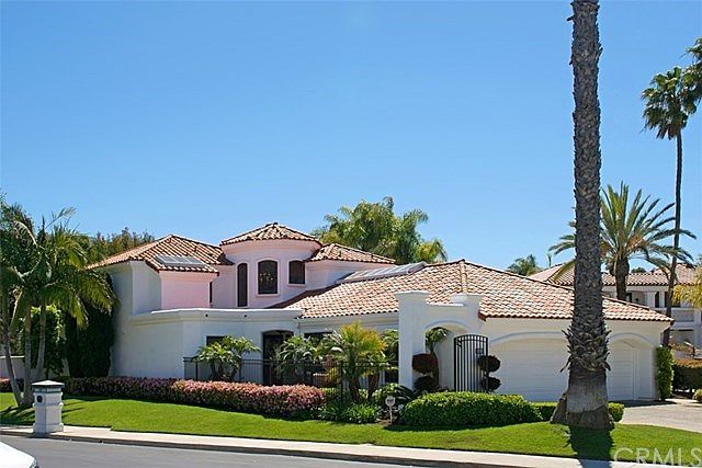 Absolutely gorgeous Mediterranean style pool home located in the prestigious gated community of Terr
