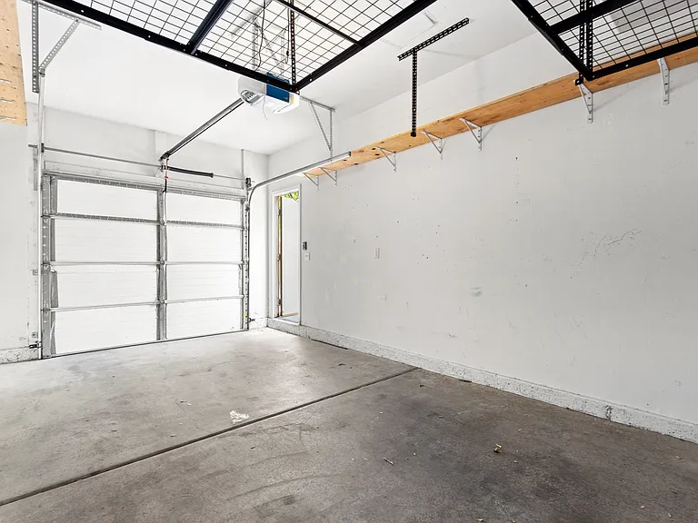 Your large 1 car garage located directly below unit. Open parking directly next to unit.