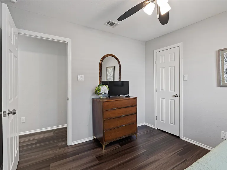 Secondary Bedroom with Twin Trundle Bed (2 Twin Mattresses) and Dresser with Walk In Closet