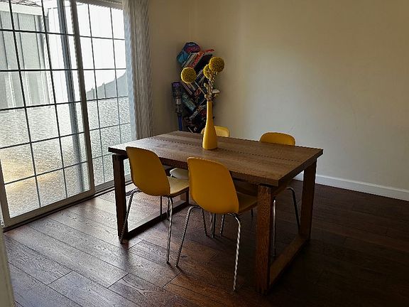 Dining area with slider to front patio and off kitchen